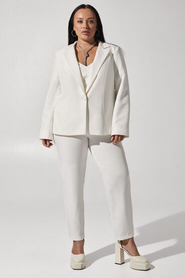 Women's milky tapered trousers made of suiting fabric plus size