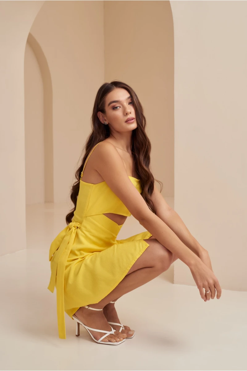 Yellow mini linen sundress with a shaped neckline