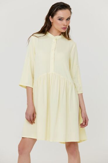 Yellow knee-length shirt dress with ruffle