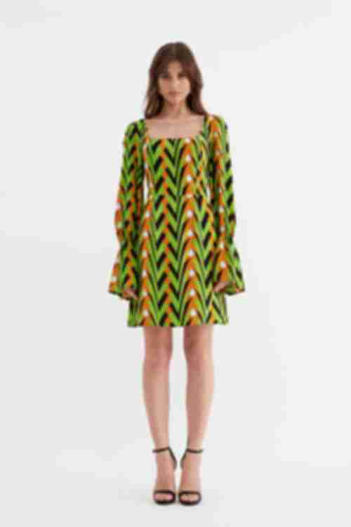 Lime mini staple cotton dress with an open back with designer print