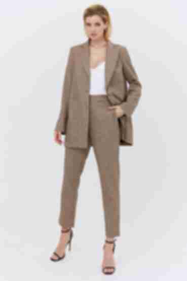 Beige straight trousers in black and brown houndstooth made of suiting fabric