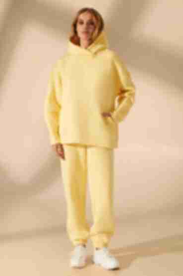Lemon knitted suit with hoodie with a yoke and trousers