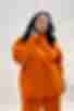 Orange knitted suit with hoodie with a yoke and trousers plus size