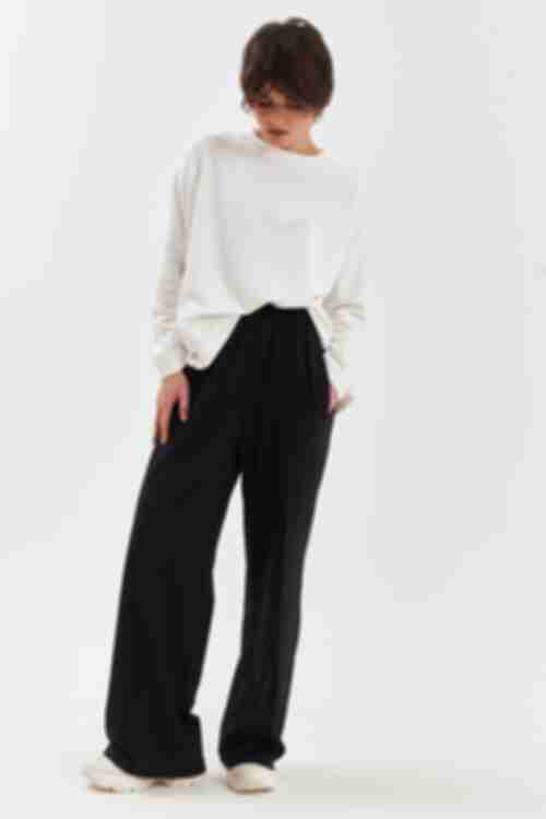Black flare trousers made of knitted fabric