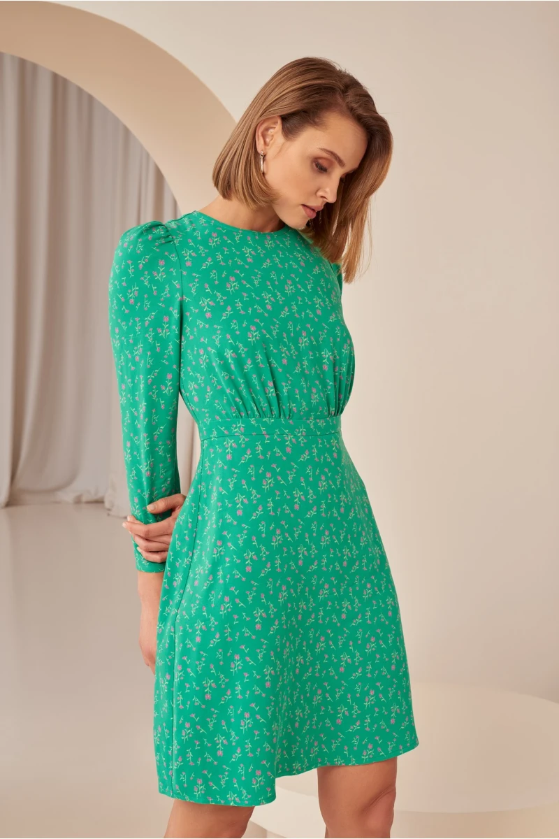 Green mini dress in small flowers made of dense staple cotton
