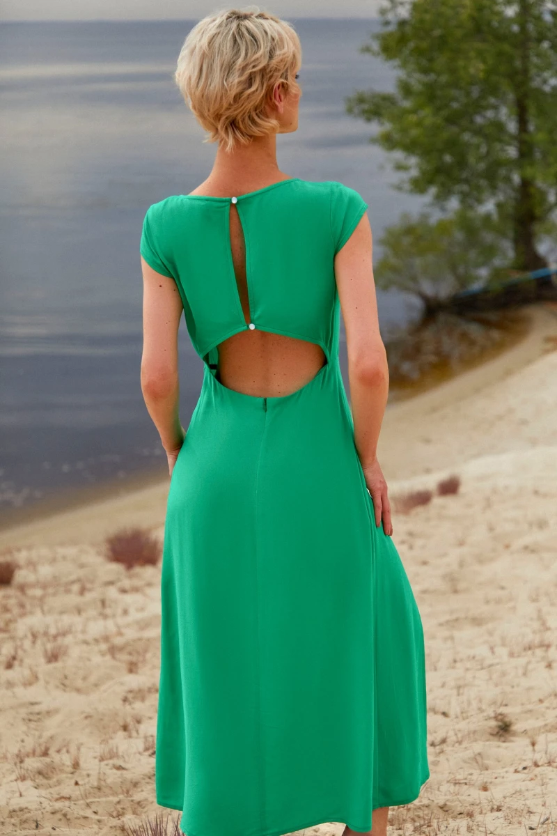 Green midaxi dress with a slit and a cutout on the back made of dense staple cotton