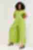 Lime jumpsuit with a sewn-in belt made of staple cotton