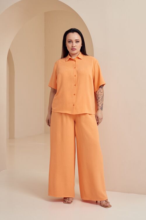 Orange palazzo pants made of crushed viscose plus size