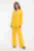Bright yellow suit with blouse and palazzo trousers made of crushed viscose