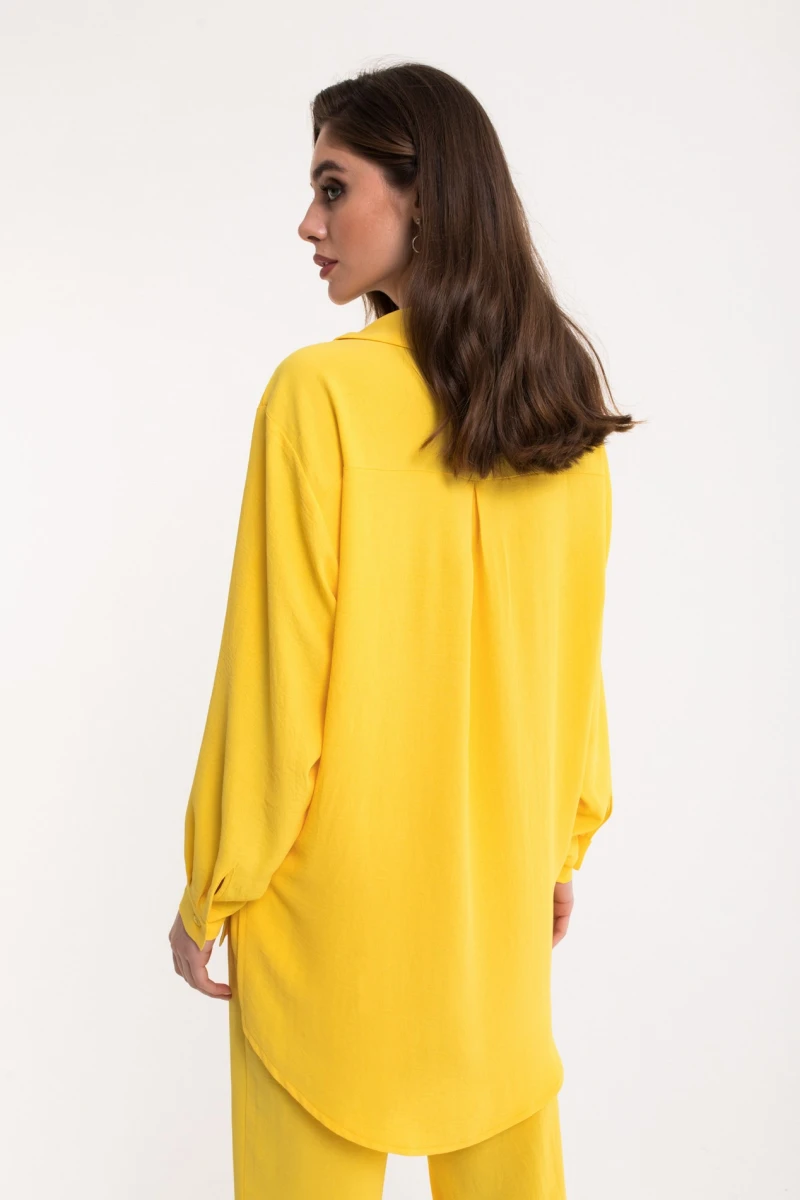 Bright yellow short-sleeved blouse made of crushed viscose