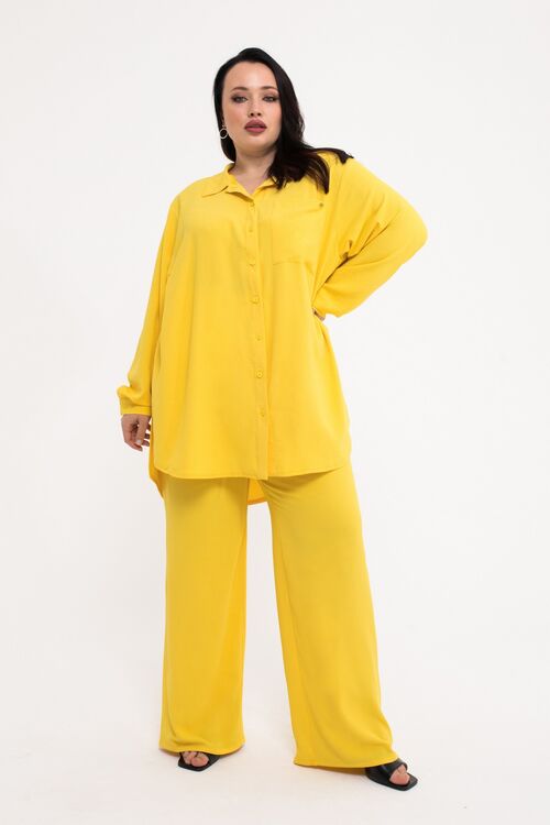 Bright yellow palazzo pants made of crushed viscose plus size