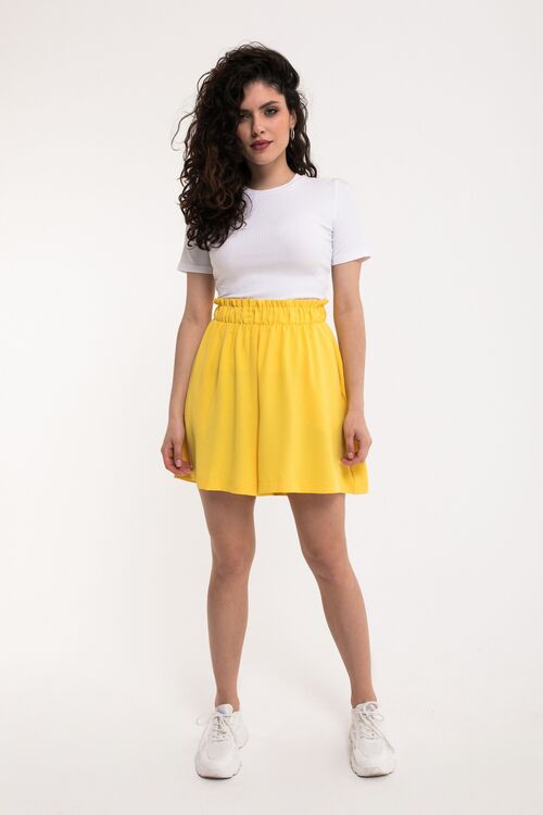 Bright yellow shorts made of crushed viscose