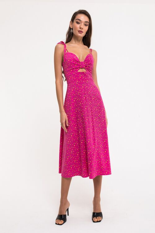 Fuchsia sundress with ties made of dense staple cotton in small vanilla flowers