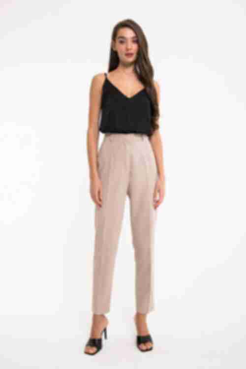 Women's beige tapered trousers made of suiting fabric