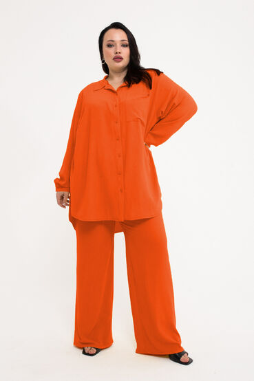 Orange palazzo pants made of crushed viscose plus size