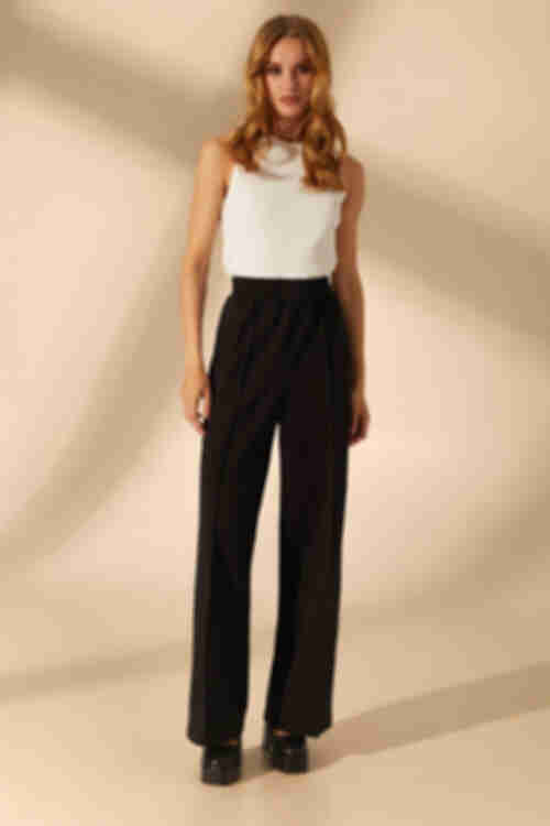 Black knitted flare trousers