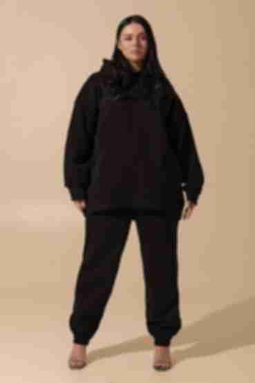 Black knitted suit with fleece with hoodie with pockets and trousers plus size