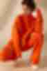 Костюм свитер с брюками вязаный оранжевый