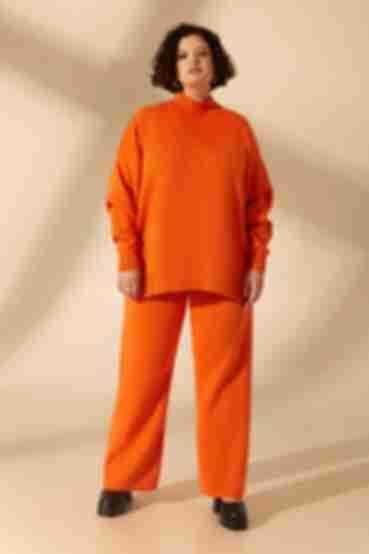 Orange knitted suit with sweater and trousers plus size