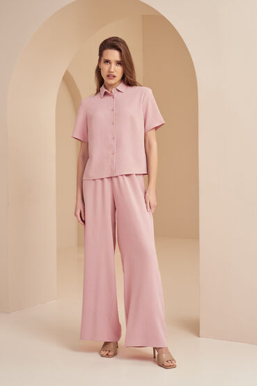 Pink crushed viscose suit with blouse with short sleeves and palazzo trousers