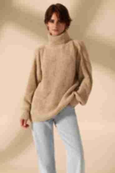 Beige knitted sweater with a high neck
