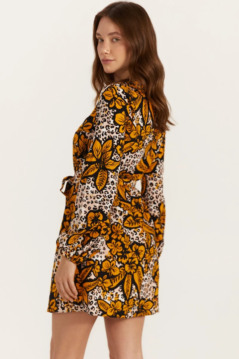 Black and white mini cotton dress in mustard print