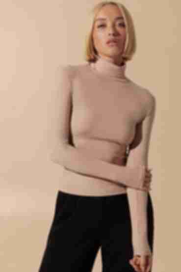 Beige turtleneck made of ribbed knitted fabric