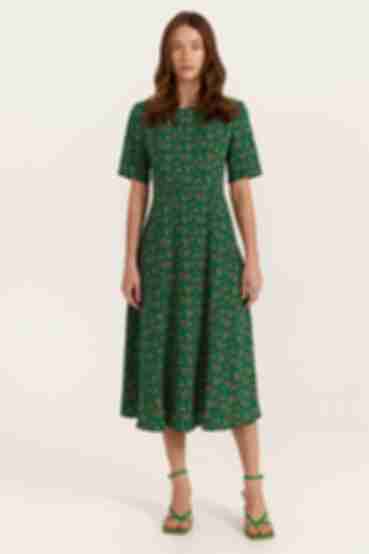 Green midi dress with A-line skirt in mustard flowers made of soft rayon