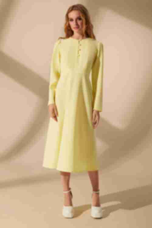 Lemon midi dress with a cut at the waist made of suiting fabric