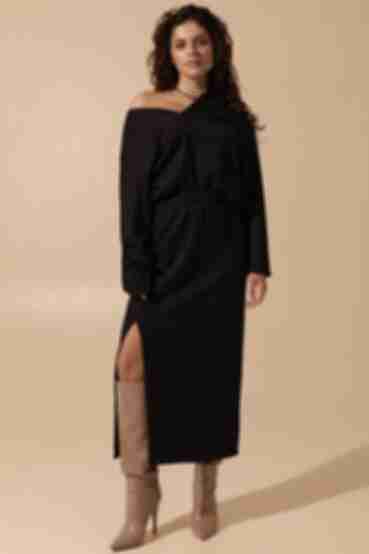 Black knitted suit with sweater and skirt