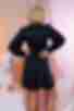 Black mini dress made of artificial silk