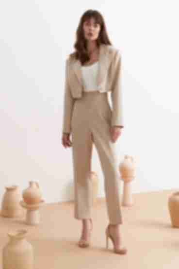 Beige high-rise trousers made of suiting fabric