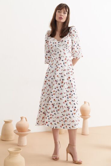 Milky midi wrap dress in flowers made of soft rayon