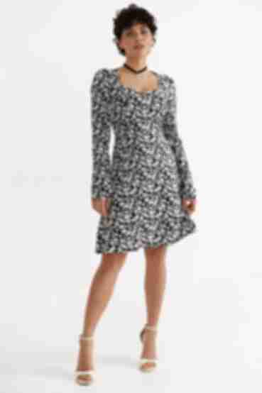Black mini dress in milky floral pattern made of staple cotton