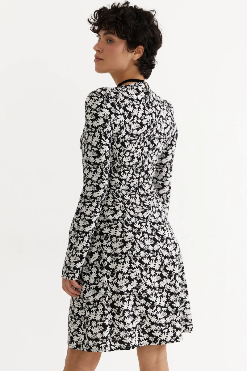 Black mini dress in milky floral pattern made of staple cotton