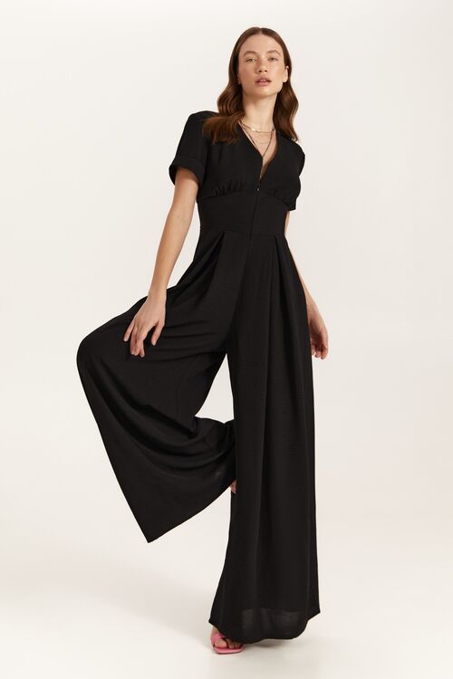 Black crushed viscose jumpsuit with a sewn-in belt