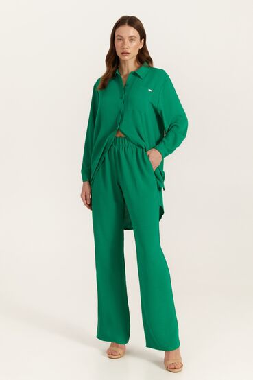 Green suit with blouse and palazzo trousers made of crushed viscose