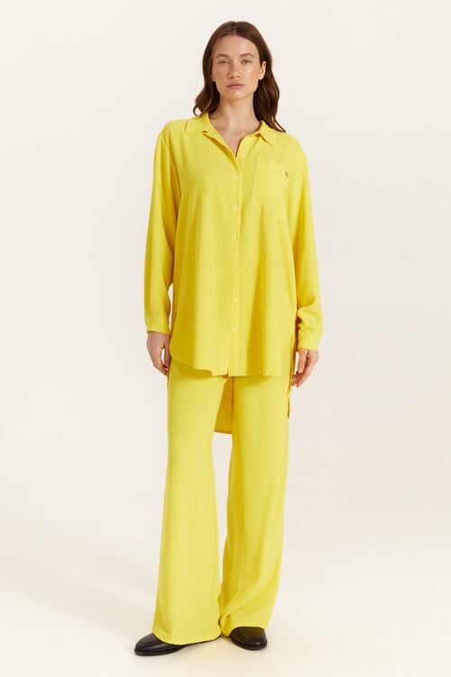 Bright yellow blouse made of crushed viscose