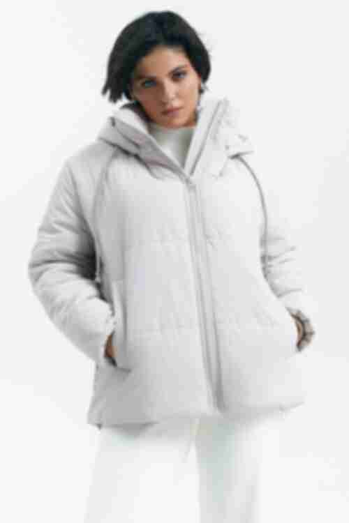 Short jacket with a hood made of crema raincoat fabric