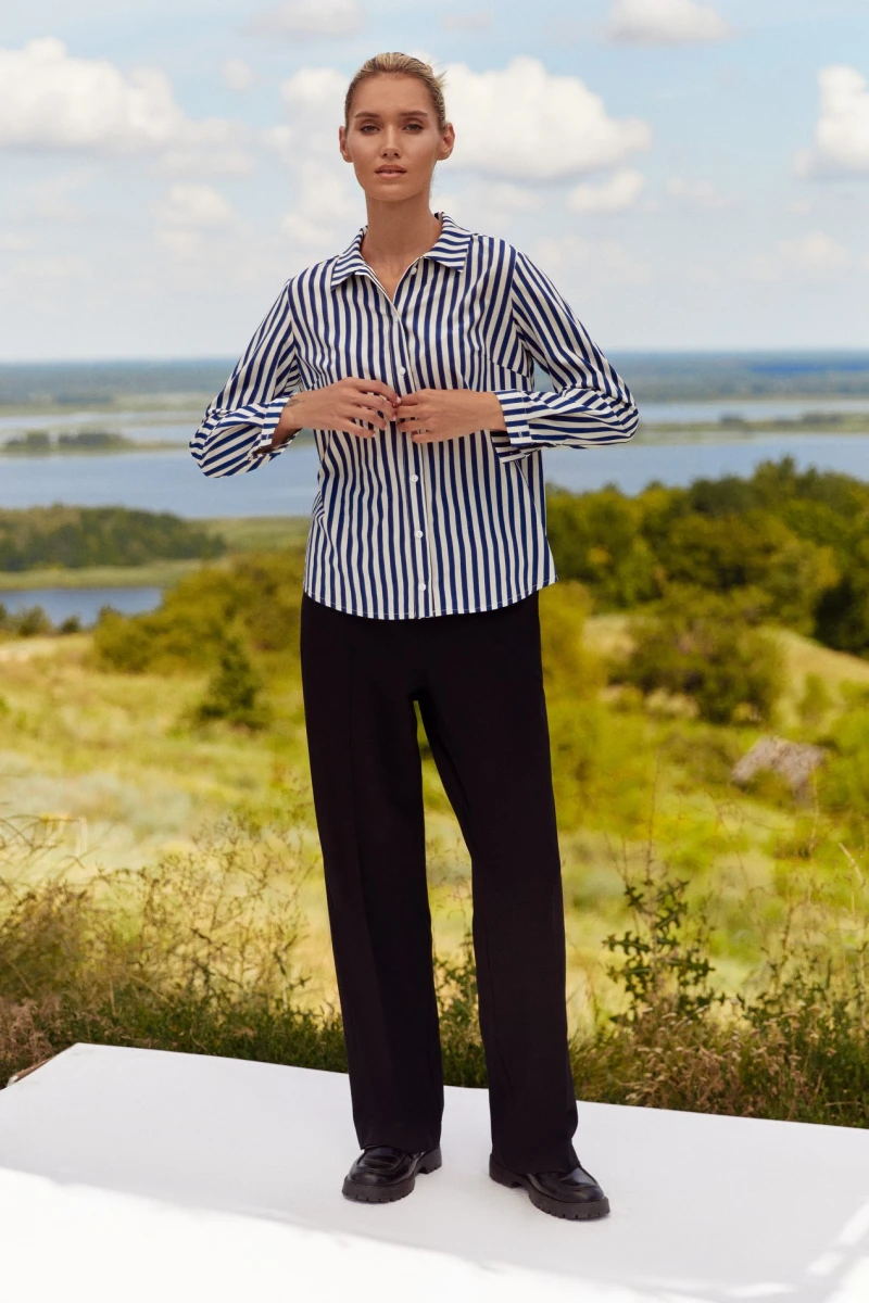 Soft blue striped shirt on milk