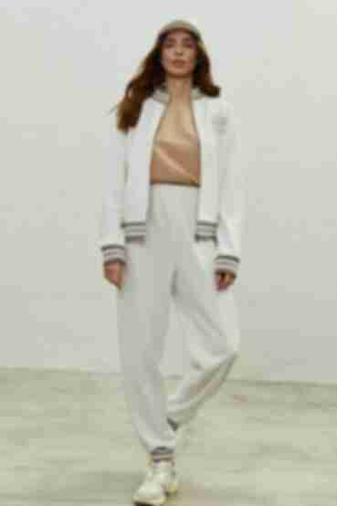 Milky knitted suit with embroidered zipped bomber jacket and pants