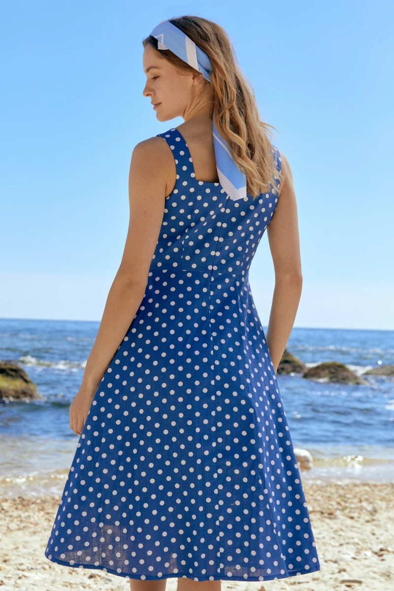 Sundress on wide straps with trapeze skirt linen milk pea on blue