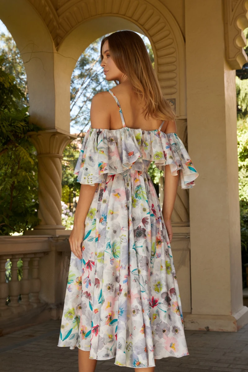 Midi sundress with frills and a lush skirt soft watercolor flowers on milky