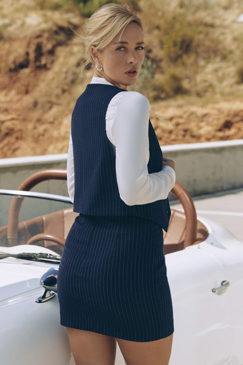 Blue mini skirt with slit made of suiting fabric in white stripes