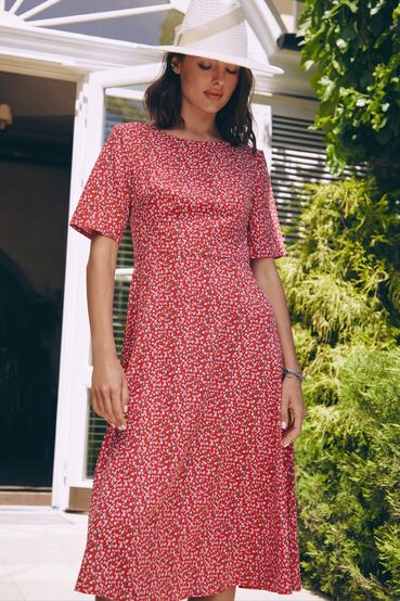 Dress with a trapeze skirt midi soft floral on red