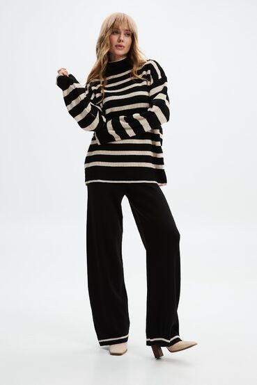 Black and beige striped sweater and trousers suit