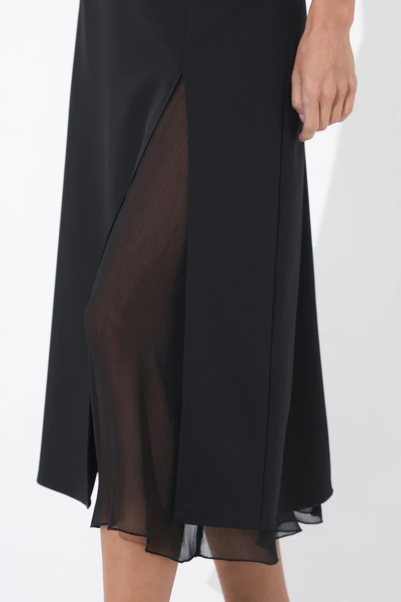 Black midi skirt with transparent insert