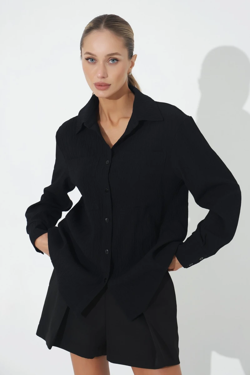 Translucent black blouse