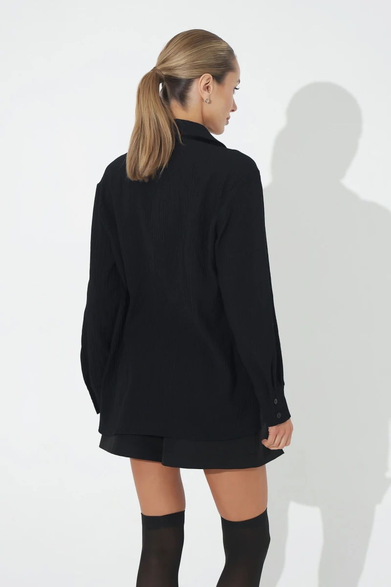 Translucent black blouse