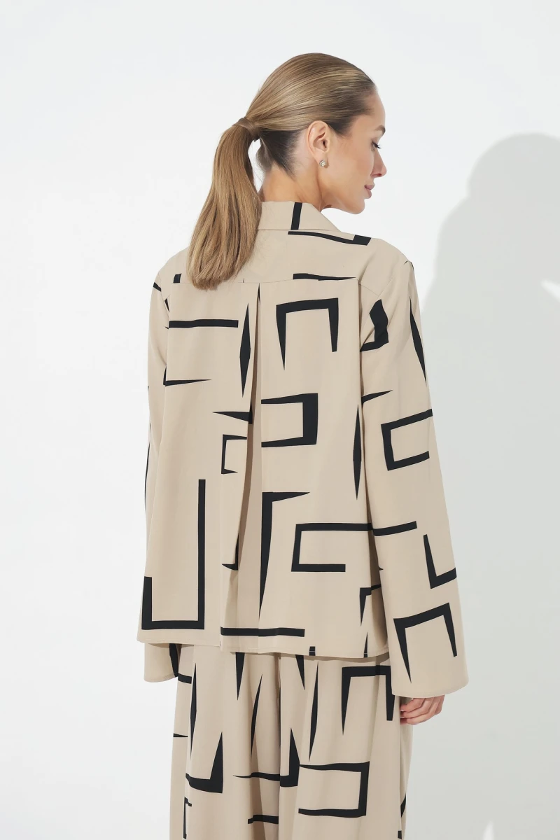 Black suit with beige print
